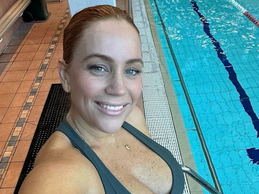 Jules Robinson shows off her huge baby bump ahead of giving birth