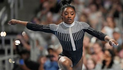 Simone Biles enjoys impressive start at Xfinity US Gymnastics Championships | CNN