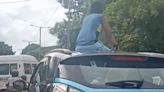 WATCH: Boy sits on sunroof of car in peak Bengaluru traffic, internet displeased