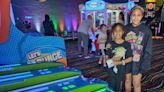 Families play glow-in-the-dark mini golf, arcade games at new City Fun Center