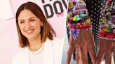 Jennifer Garner shows off the friendship bracelets fans gave her at Taylor Swift’s concert