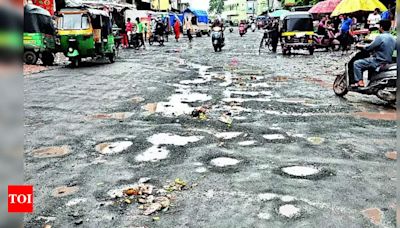 Protests Erupt Over Poor Road Conditions in Surat | Surat News - Times of India