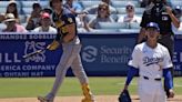 Yelich, Perkins power Brewers to 9-2 victory over Dodgers and avoid being swept in weekend series