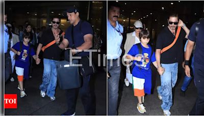 Shah Rukh Khan returns to Mumbai with AbRam and Gauri Khan after UK trip | - Times of India