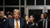 Former US president Donald Trump arrives to speak to the media at the end of the day's proceedings in his criminal trial at Manhattan Criminal Court