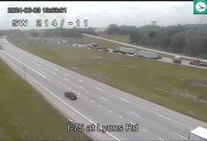 UPDATE: Lanes reopen after car fire on I-75 in Miami Twp