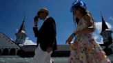 Kentucky Derby fans pack the track for the 150th Run for the Roses