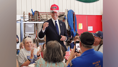 Biden wears 'Trump 2024' hat at Pennsylvania fire station to promote unity