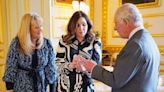 King is presented with £5 coin featuring his crowned portrait for first time