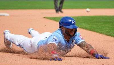 Royals score 3 in ninth to shock Padres, avoid sweep