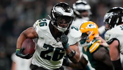 Barkley scores 3 TDs as Eagles beat Packers 34-29 in Brazil. Packers' Love injured in final minute