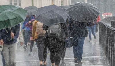 Thunderstorms and lightning bring risk of flooding to parts of England and Wales