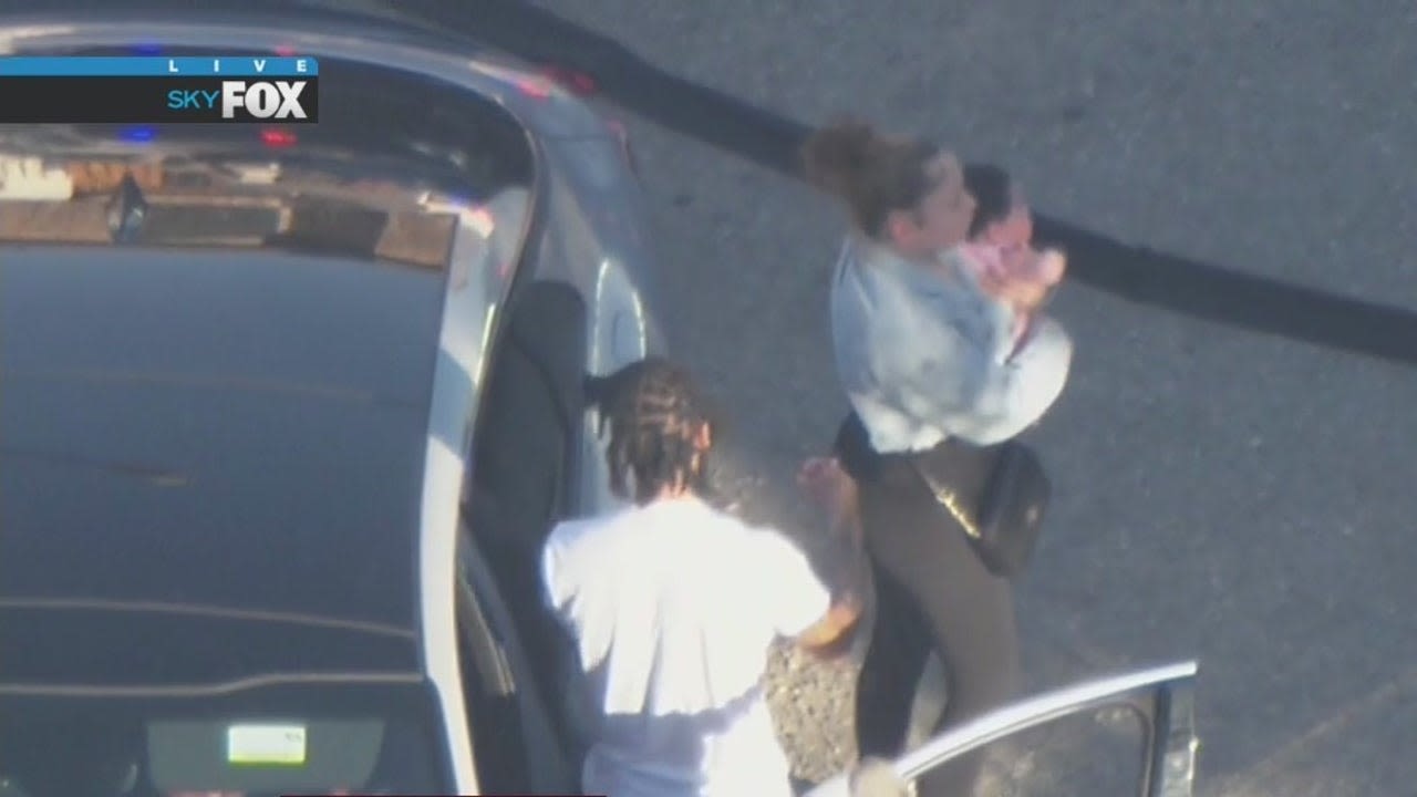 LA police chase: Infant safely recovered, driver taken into custody after hugging woman, child