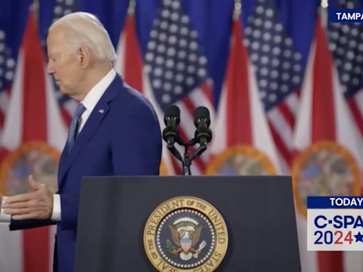 Fact Check: Video Supposedly Shows Biden Trying to Shake Hands with a 'Ghost' on Stage. Here's the Truth