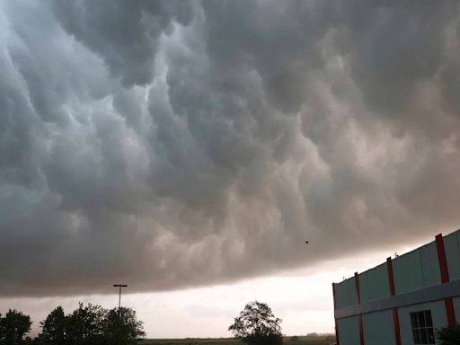 Tornado overturns trucks and damages homes as Texas and Oklahoma residents told to seek shelter