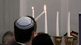 Polish parliament relights Hanukkah candles extinguished by far-right politician