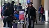 276 Indians stuck in a French airport for days for a human trafficking probe arrive in India