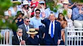 Melania Trump laughs at Donald during Barron's graduation