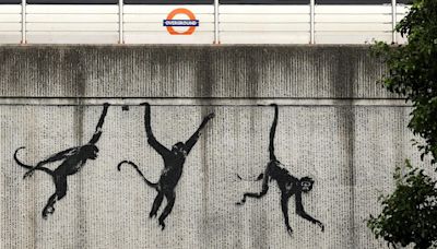 Banksy's new urban jungle sparks hunt for hidden meaning