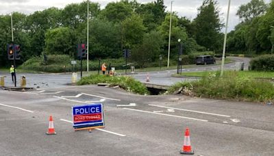 Burst water main causes road to collapse