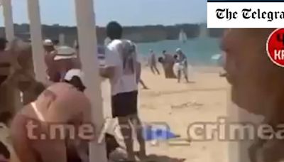 Ukrainian Atacms blows up over Crimean beach forcing sunbathers to flee as Russia claims five killed