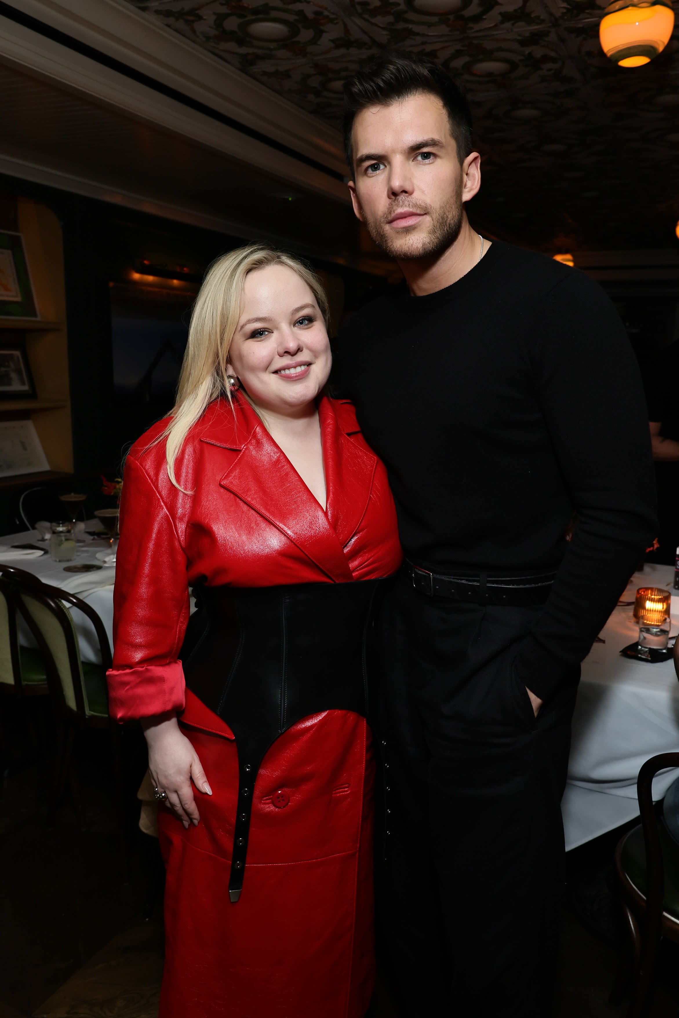 Bridgerton Star Nicola Coughlan Wore a Tight Black Corset Over a Red Leather Trench Coat — See Photos