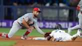 Cardinals edge Marlins 7-6 in 12 innings