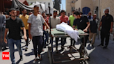 Israel kills dozens as it steps up Gaza bombardment - Times of India