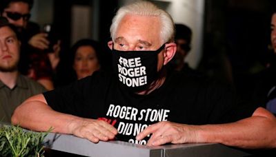 Roger Stone reacts after Trump commuted his federal prison sentence in Fort Lauderdale