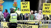 Royal fans turn out to support Charles as streets lined by anti-monarchy mob