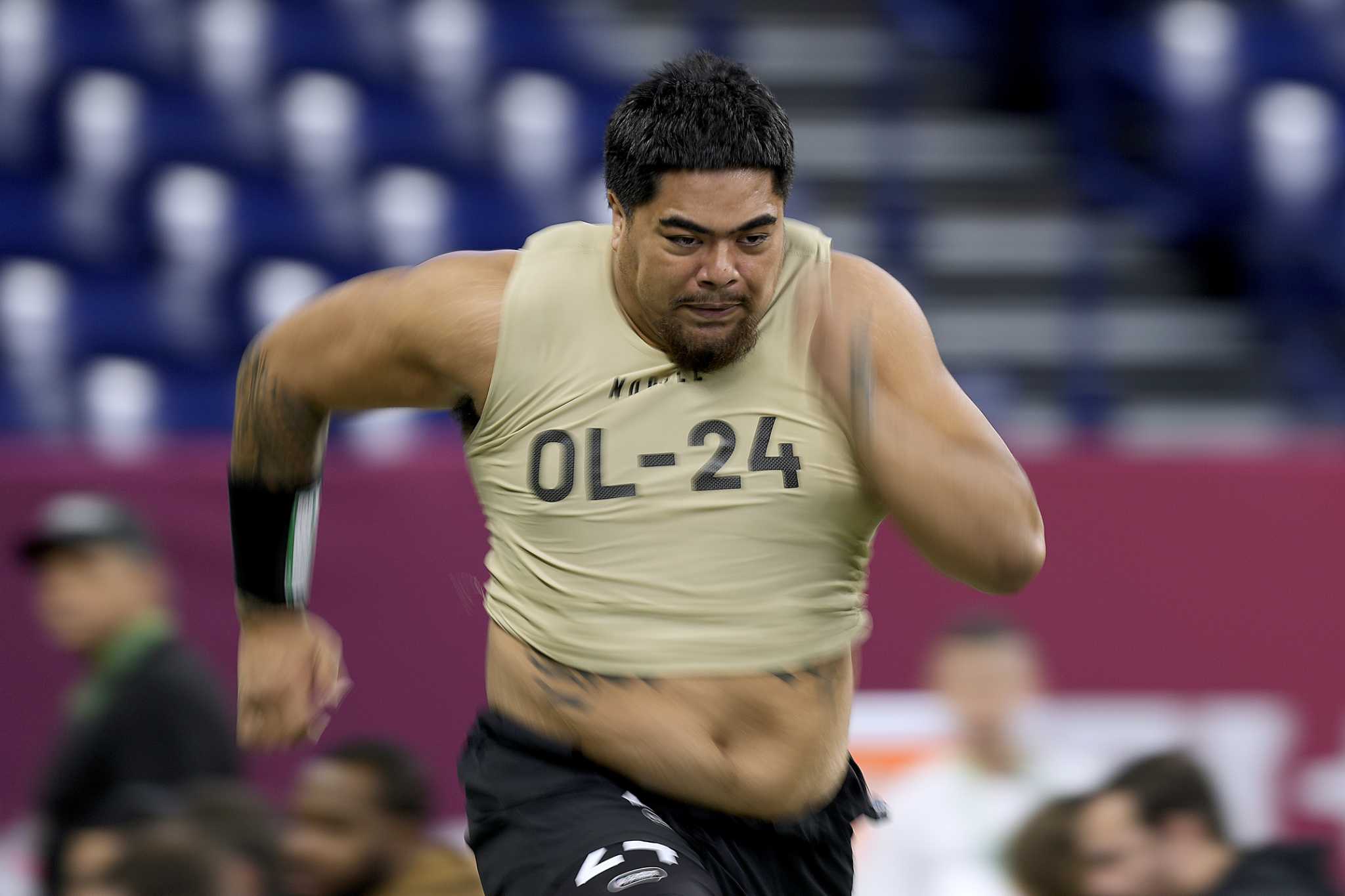 Saints sign their top draft choice, offensive tackle Taliese Fuaga