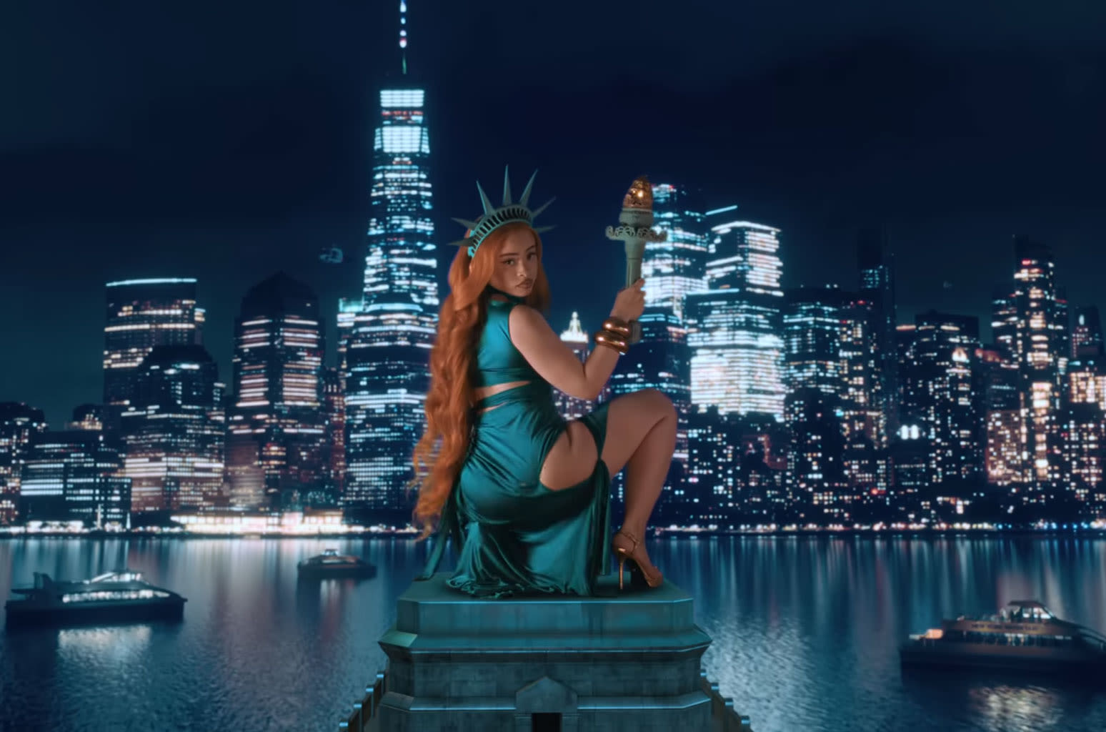 Ice Spice Transforms Into the Statue of Liberty for NYC-Themed ‘Oh Shhh…’ Video With Travis Scott