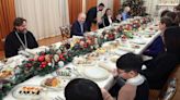 Putin stages lavish dinner for dead soldiers' families on Orthodox Christmas Eve