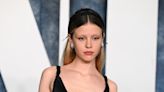 Mia Goth embodies her namesake in a sultry leather 'goth' look