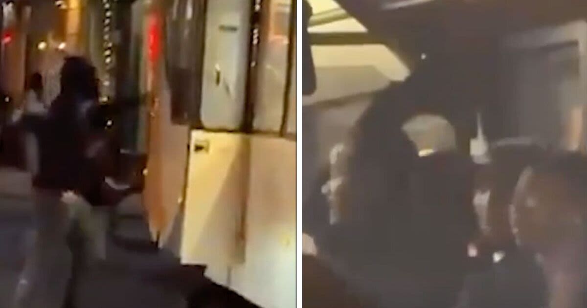 Moment passengers hide at front of bus being attacked by thugs in horror riots