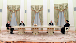 Putin hosts Iranian president for Kremlin talks