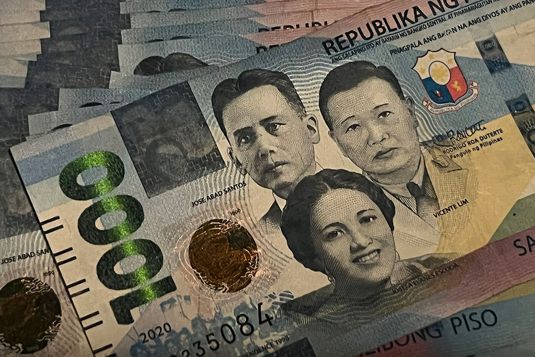 Peso drops on market caution after Biden decision - BusinessWorld Online
