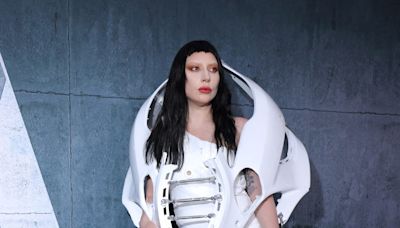 Lady Gaga Goes Full ‘Transformers’ Mode In a Car Part Dress