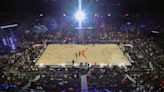 How many WNBA teams share arenas with NBA teams?