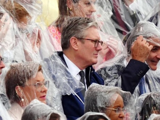 'We're used to rain': UK PM Keir Starmer at Paris Olympics getting drenched; pic goes viral - Times of India