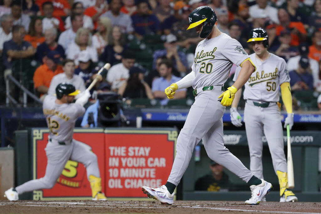 A’s score 2 runs in 12th to outlast Astros 4-3