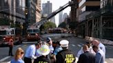 Top of New York City crane crashes into street, injuring six