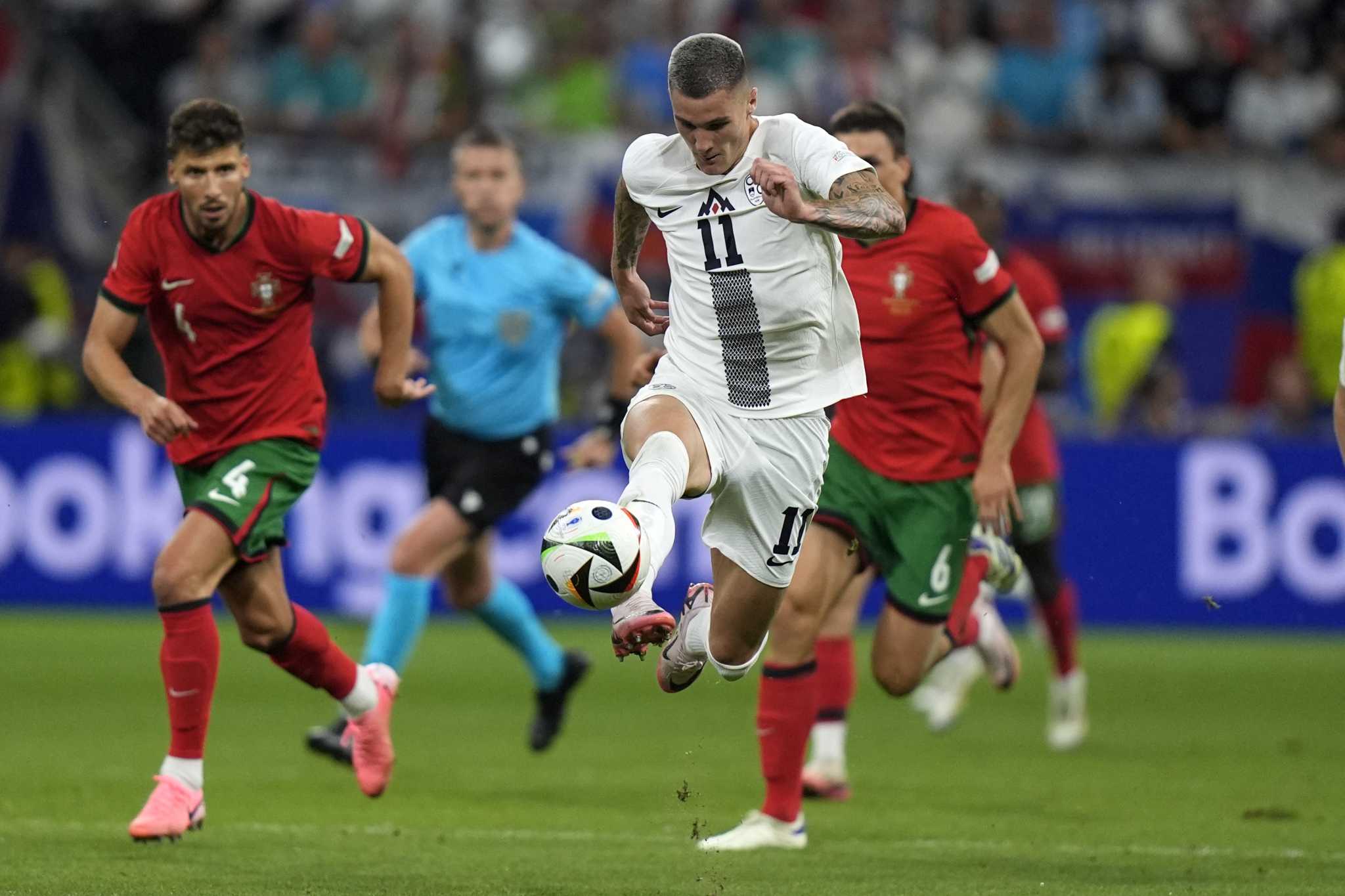 Slovenia forward Šeško misses two chances to end Euro 2024 for Ronaldo's Portugal