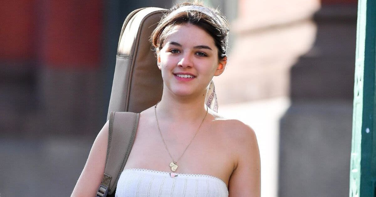 Suri Cruise, 18, flexes musical interest after ditching her dad's surname