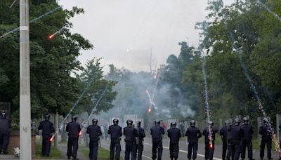 Security operation amid fresh clashes at site earmarked for asylum seekers