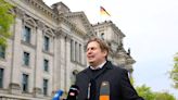 German far-right politician digs in after aide accused of spying for China