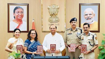 IPS Sunil Kumar Gautam presents his new book to LG Delhi Vinay Kumar Saxena