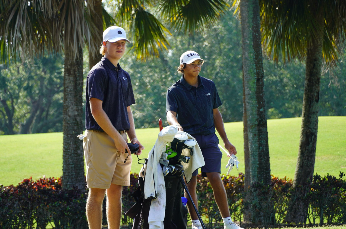 Photos: Tiger Woods and Trevor Immelman watch their sons, Charlie and Jacob, play in AJGA event