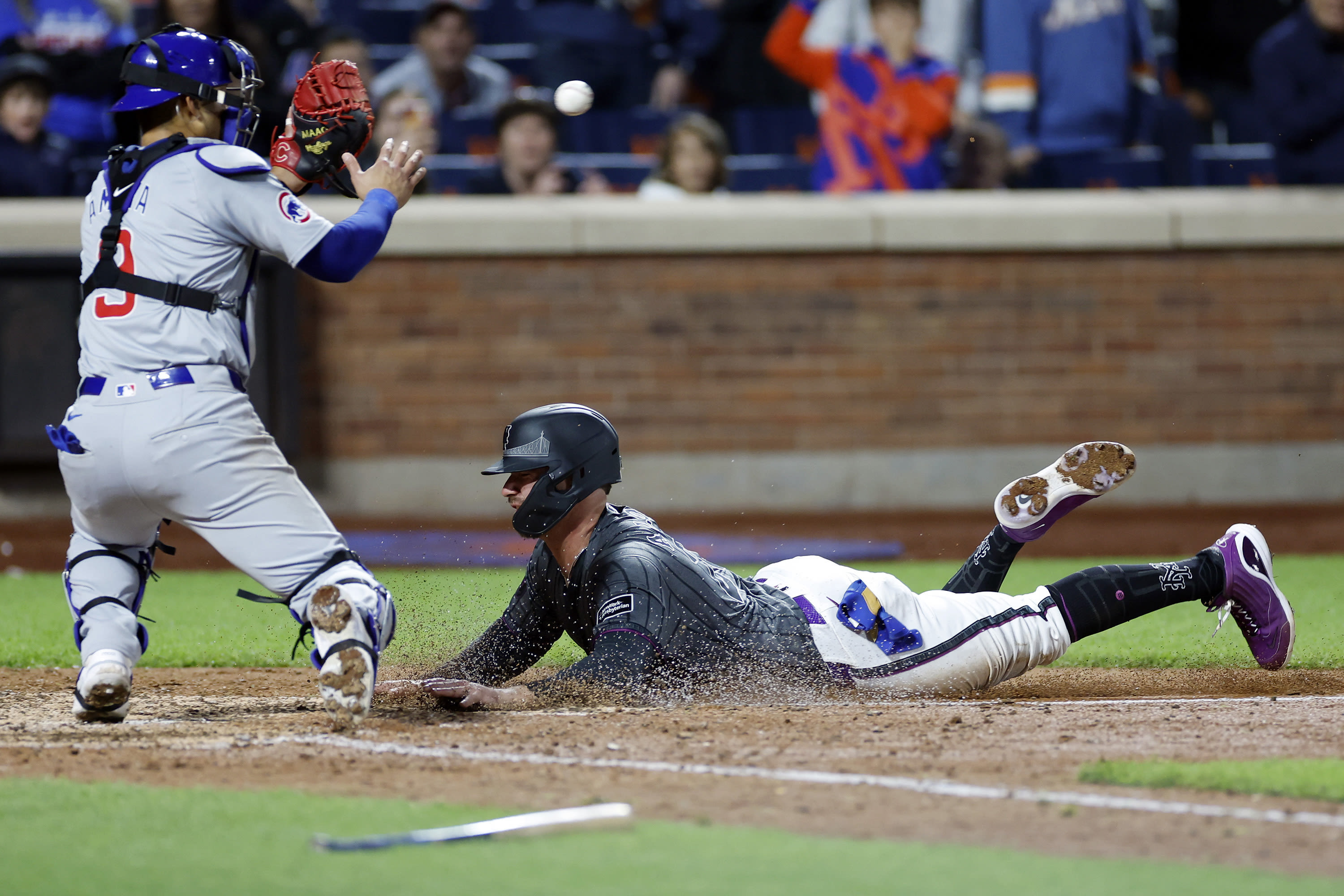 Mets' 9th-inning challenge ruled unsuccessful as Cubs steal a victory with wild ending