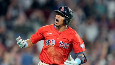 Boston s Ceddanne Rafaela tagged out for double play while talking to third base coach Kyle Hudson